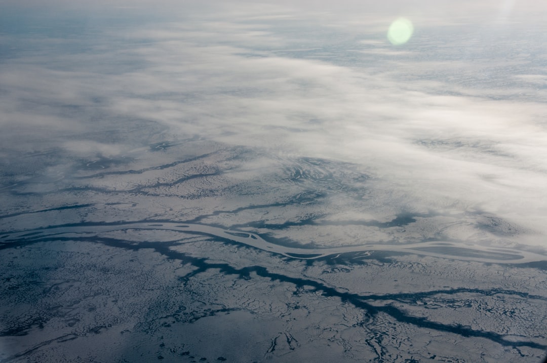 Photo magnetic north pole drift effects